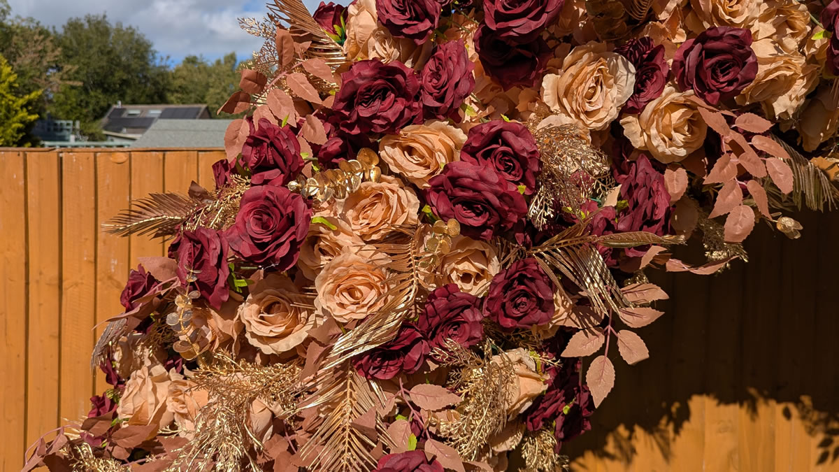burgundy gold arch close up